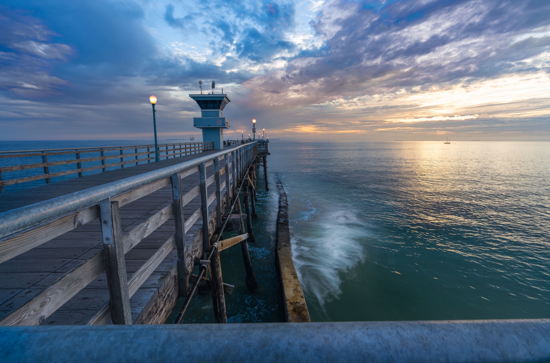 Clouds over the Seal Beach pier before a storm